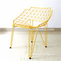 yellow wire dining chair with armrest